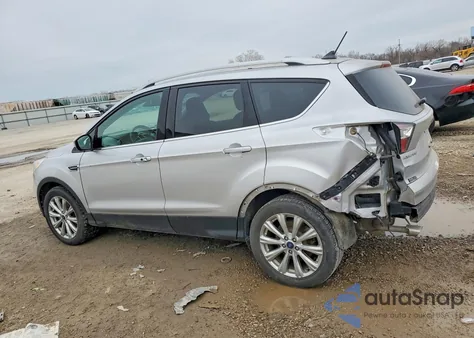 2018 Ford Escape Titanium z USA, uszkodzony, nr VIN 1FMCU0J99JUA32627